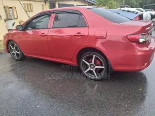 Toyota Corolla L 4dr Sedan (1.8L 4cyl 5M) 2013 Burgundy