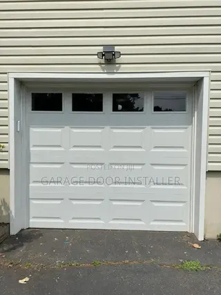 Automatic Garage Door With Remote and Glass Windows