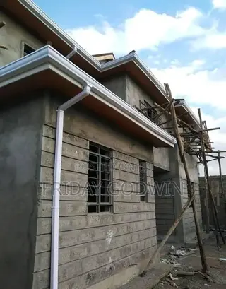 Installation of Rain Gutter and Downspout