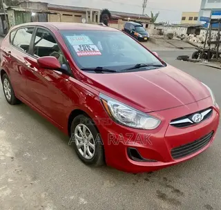 Hyundai Accent GS 4dr Hatchback (1.6L 4cyl 6A) 2014 Red