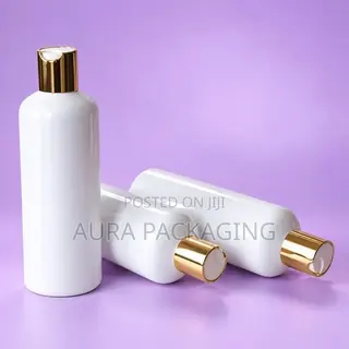 White Shower Gel or Lotion Bottle With Gold Press Cap