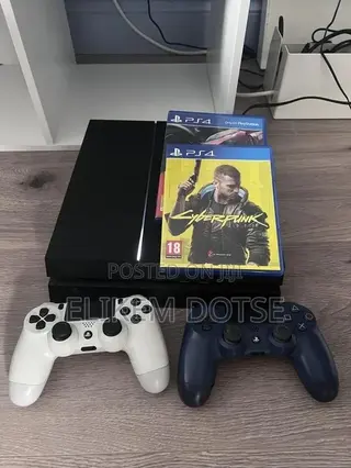 PS4 Fat With Two Controllers and Games
