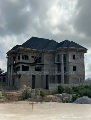 Shingles Roofing and Concrete Parapet