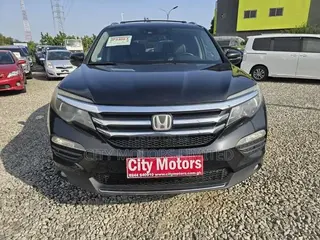 Honda Pilot Touring 4dr SUV 4WD (3.5L 6cyl 9A) 2016 Black