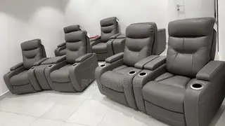 Jabarr 7-Pc. Beyond Leather Theater Seating With 3 Consoles