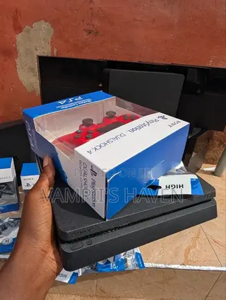 PS4 SLIM With FC 27 Other 7 Games