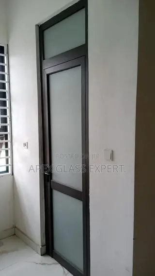 Grey Colour Hinge Door With Frosted Glass by Apexglassexpert