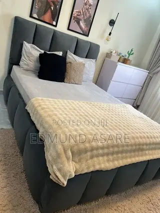 Slightly Used King Size Mattress With Bed Frame and a Side Carbinet