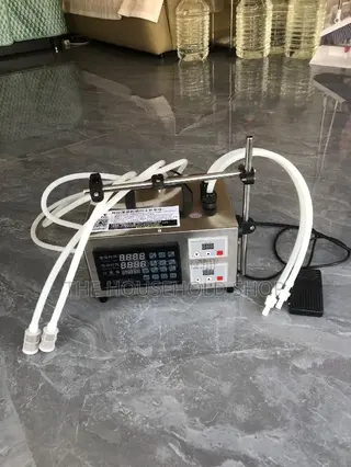 Double Nozzle Liquid Filling Machine