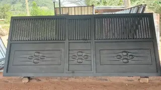 Modern Black Steel Gate With Decorative Design – Strong & Durable