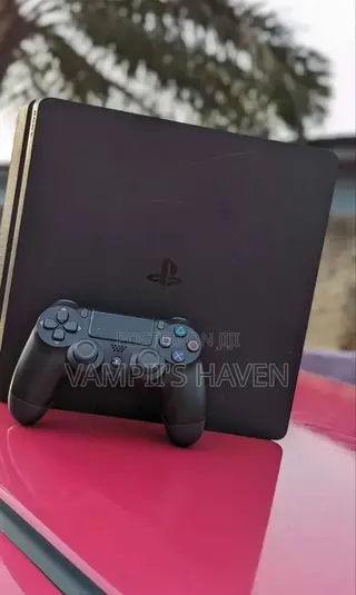 PS4 SLIM With 2 Controllers FC27 and All Games