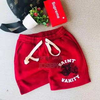 Red Graphic Drawstring Shorts With a Bold Dripping-Style Design