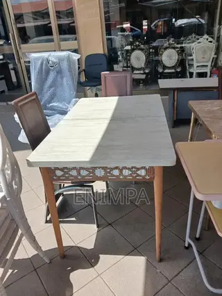 An Authentic Gray 4 Seater Dining Set