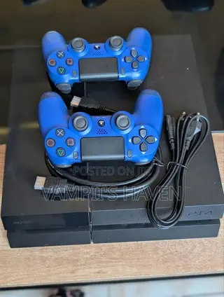 PS4 With 2 Controllers 8 Games HDMI Cable and Controller Charger