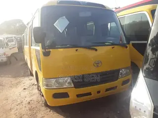 Toyota Coaster 2012 Yellow