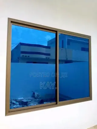 Aluminium Sliding Window With Tinted Glass – Durable & Modern Design