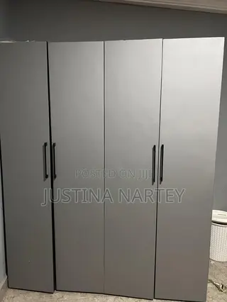 6ft Tall Four Door Wardrobe With Many Compartments. Almost New