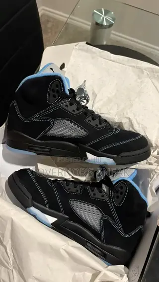 Jordan 4 Black Carolina