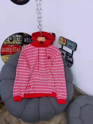 Red and White Patterned Hoodie With a Comfortable Hood