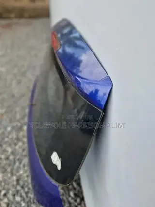Nissan Versa 08 Hatchback Booth Glass