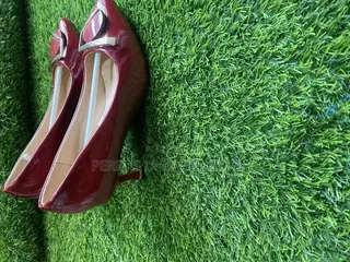 Crimson Royale Patent Buckle Heels