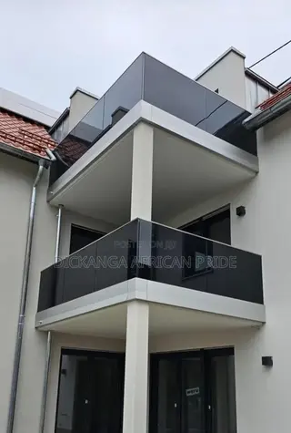 Glass Balustrade With Stainless Steel Handrails.