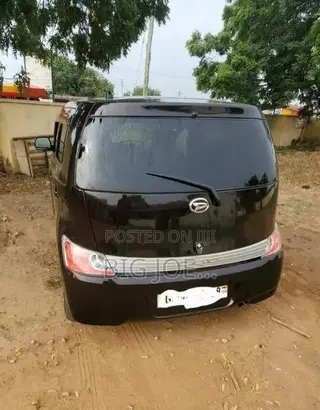 Daihatsu Cuore 2015 Brown