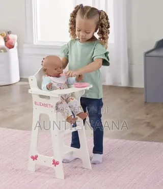 Cute Doll in a Highchair