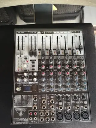 Behringer Xenyx 1204FX Audio Mixing Console.
