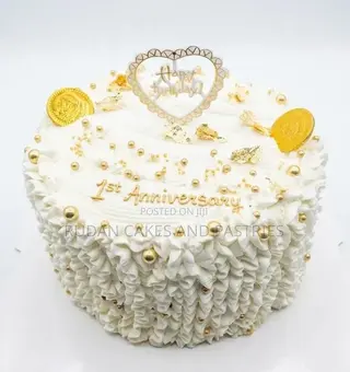 Stunning White and Gold Celebration Cake