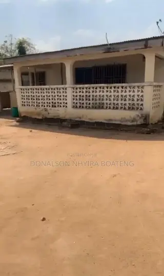 1 Plot of Land With a House