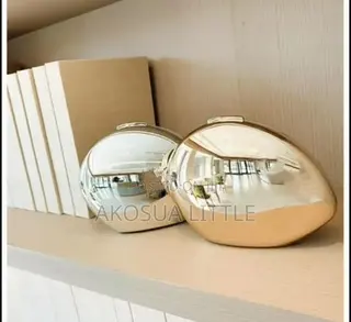 Gold Metallic Egg-Shaped Clutch Bag