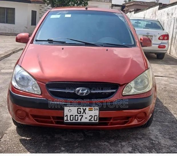 Hyundai Getz 1.4 2011 Orange · Photo 1