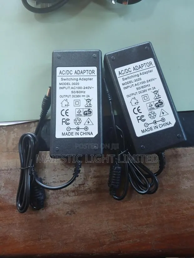 Switching Power Adapter · Photo 1
