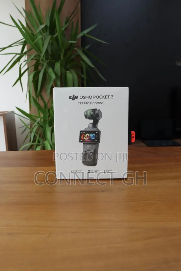 DJI - Osmo Pocket 3 3-Axis Stabilized Handheld Camera · Photo 1