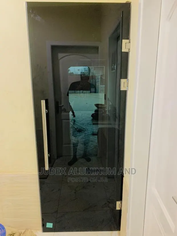 Frameless 10mm Hinge Tempered Glass Door Dark · Photo 1