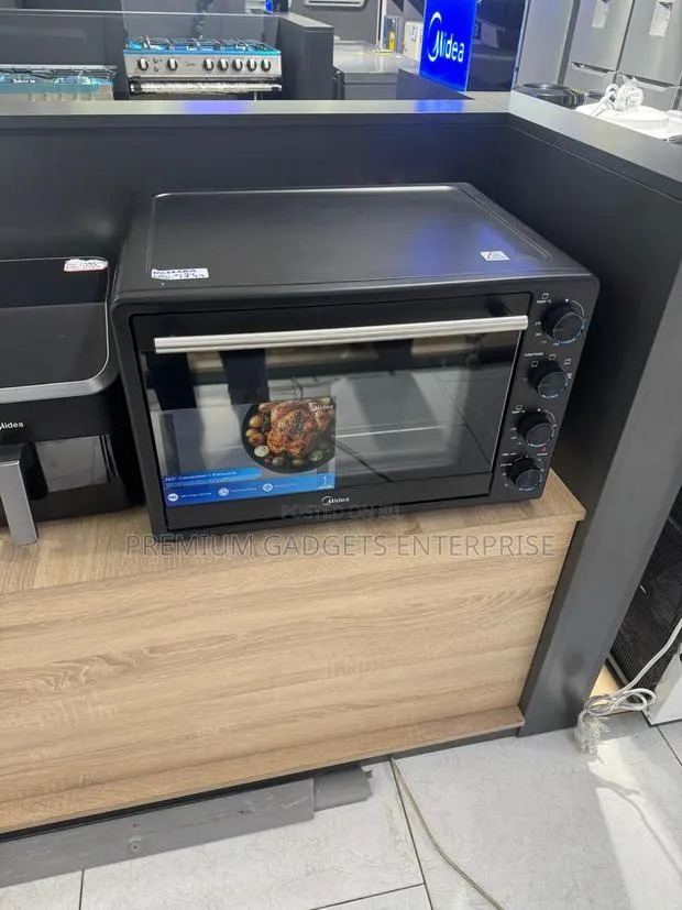 Midea 68l 2000w Multi-Functional Electric Toaster Oven W/ Rotisserie · Photo 1