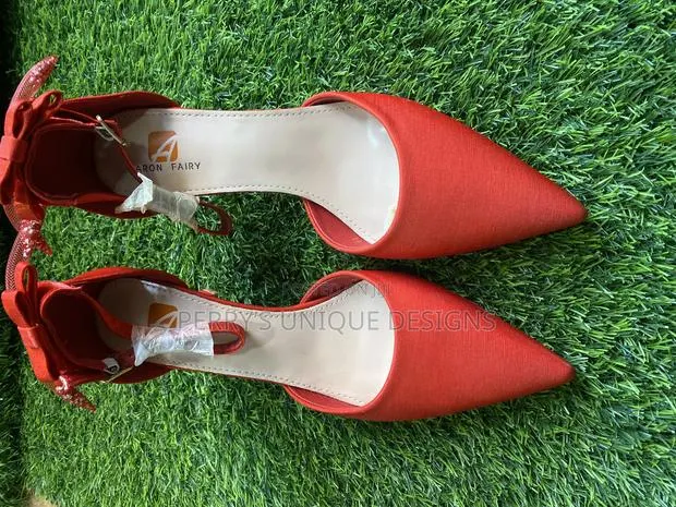 Ruby Luxe Bow-Tie Pointed Heels · Photo 1