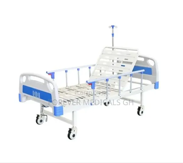 One Crank Hospital Bed With Drip Stand, Overhead Table (No Mattress) · Photo 1