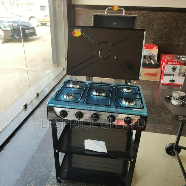 Hugely Discounted 5 Burner Gas Stove With Shelf From Decakila · Photo 1