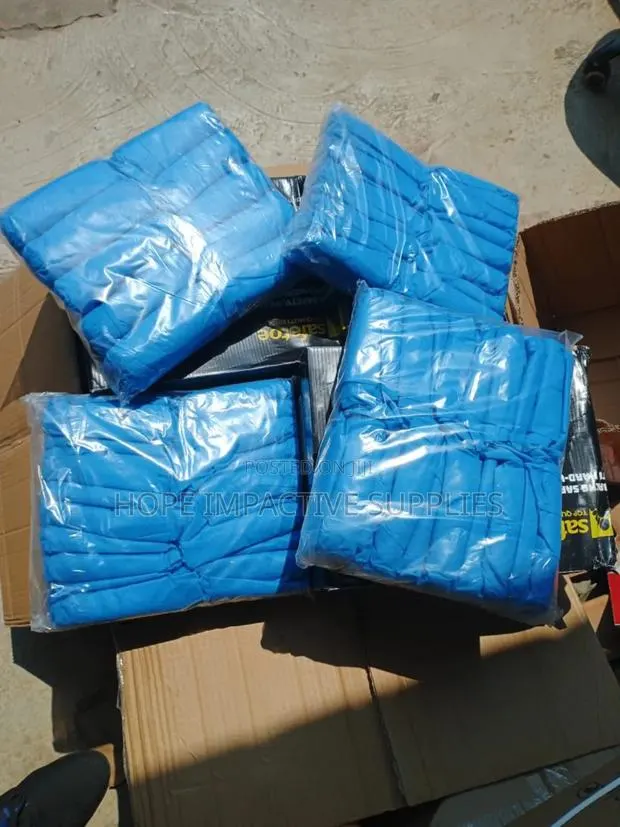 Quality Shoe Cover - Fabric Type-(100pcs Per Pack). · Photo 1