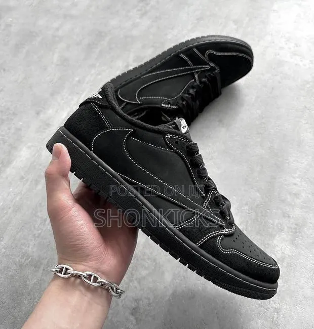 Jordan 1 Low Travis Scott Black Phantom · Photo 1
