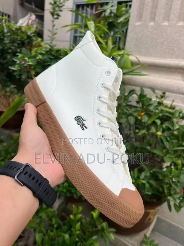 High Top Lacoste Sneaker Comes in Different Colours , Swipe > · Photo 1