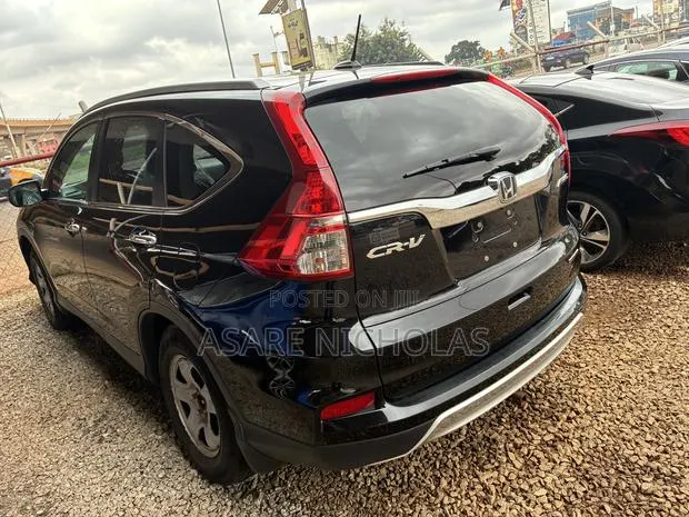 Honda CR-V Touring 4dr SUV AWD (2.4L 4cyl CVT) 2016 Black · Photo 1