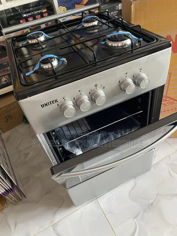 Unitek 4 Gas Burner Cooker,Strong Cast Iron Pan Supports · Photo 1