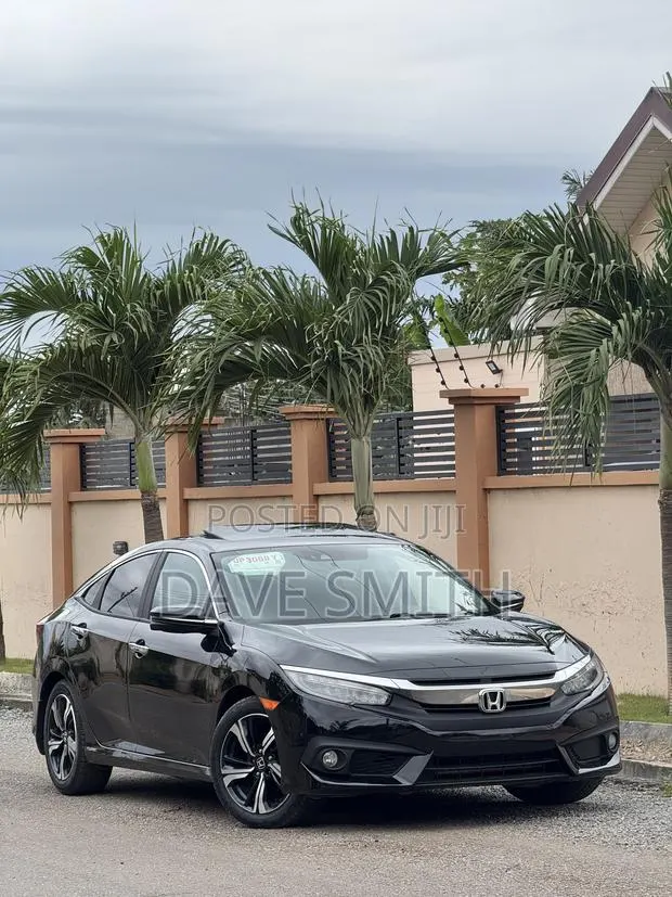 Honda Civic Touring 4dr Sedan (1.5L 4cyl) 2016 Black · Photo 1