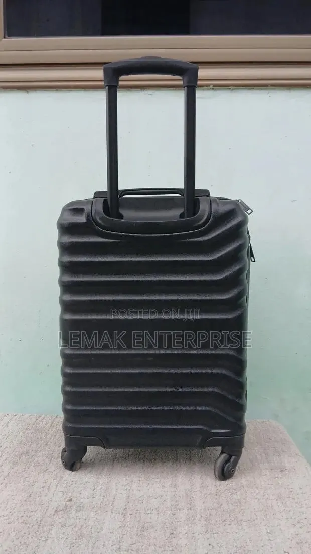 Featherstone 4-Wheel Hard Traveling Suitcase · Photo 1