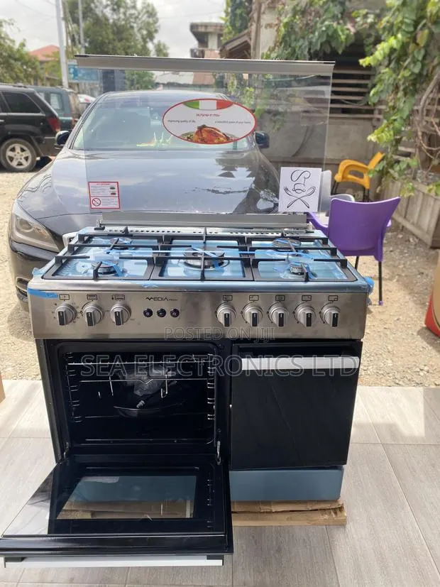Available Mediatech 5 Burner Oven and Grill · Photo 1