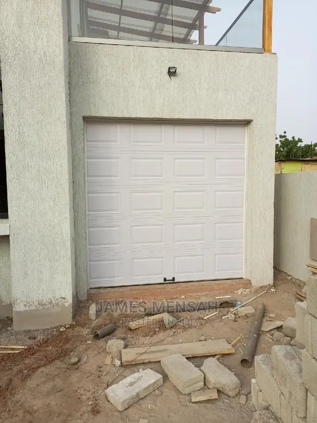Automatic Garage Door Opener · Photo 1