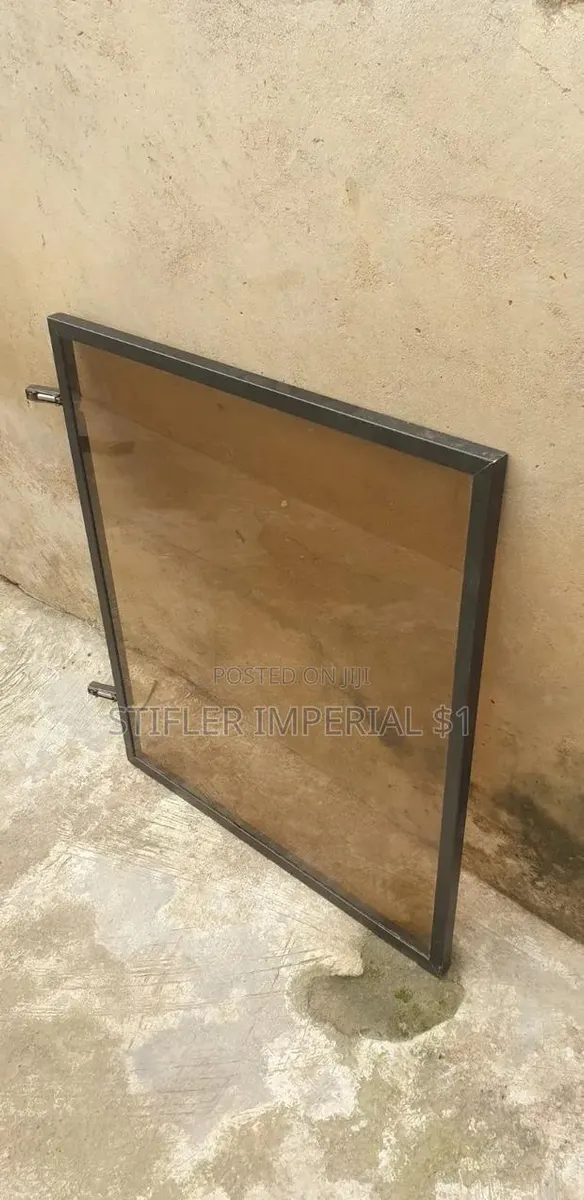 Metal Frame With Solid Tinted Glass · Photo 1